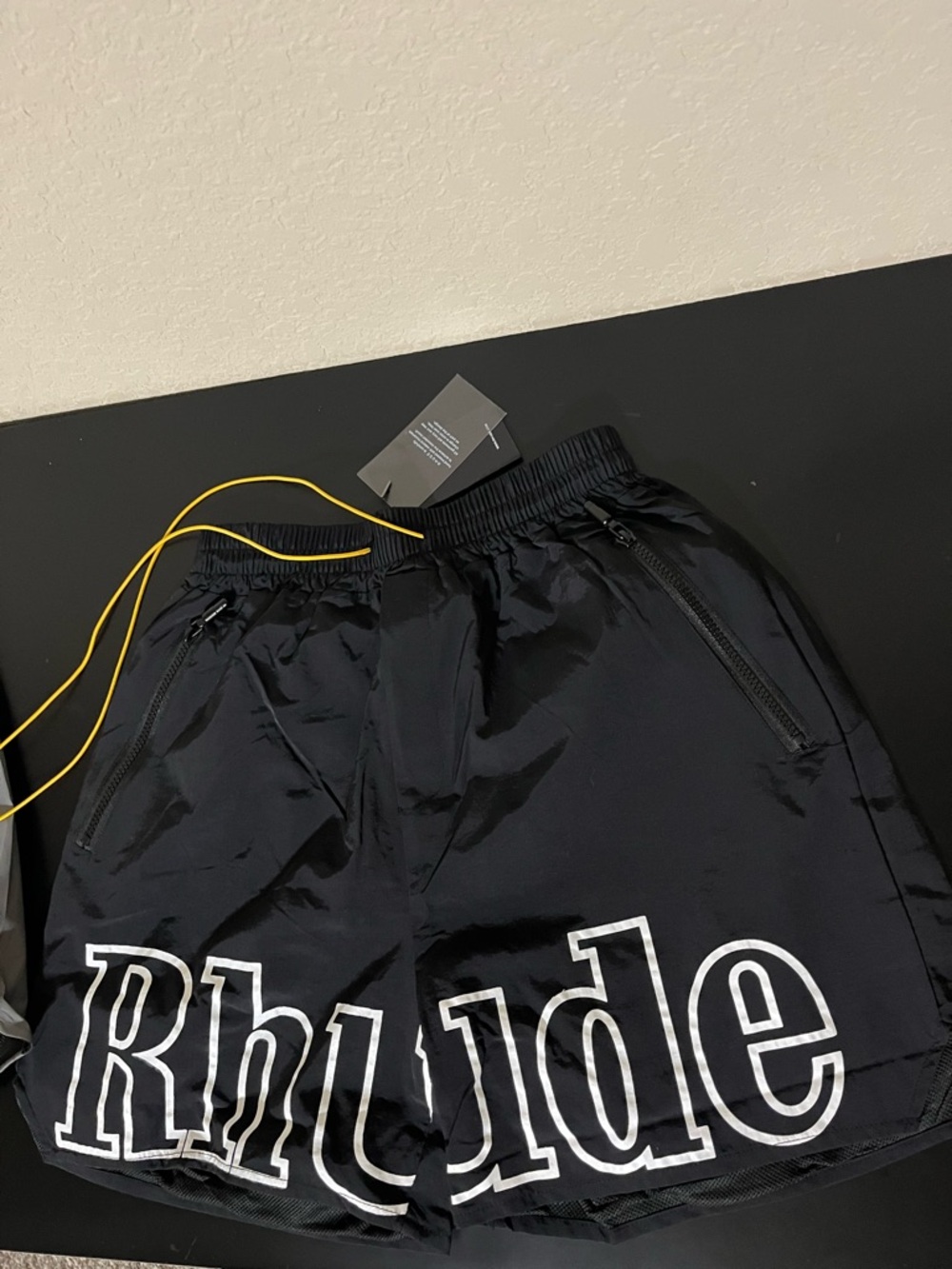 Rhude Black Nylon Shorts with White Logo and Yellow Drawstring
